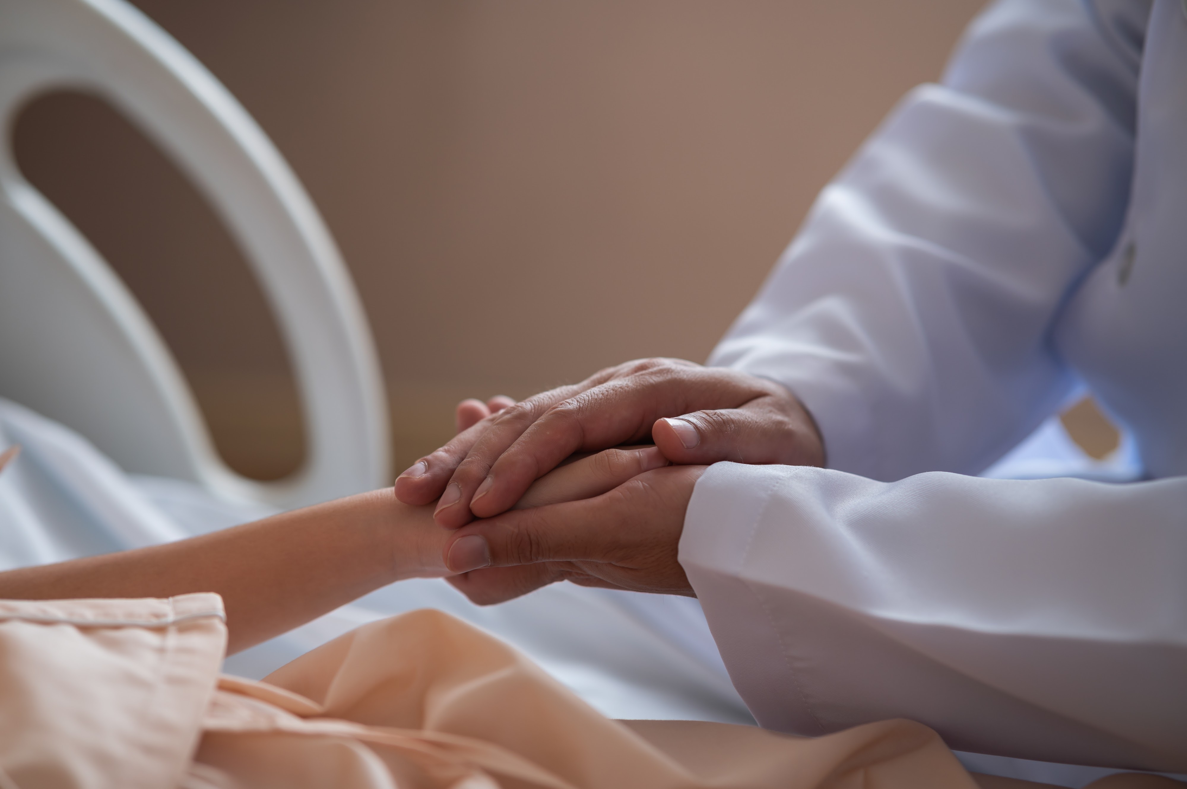 Medical professional consulting with patients about fertility treatment options